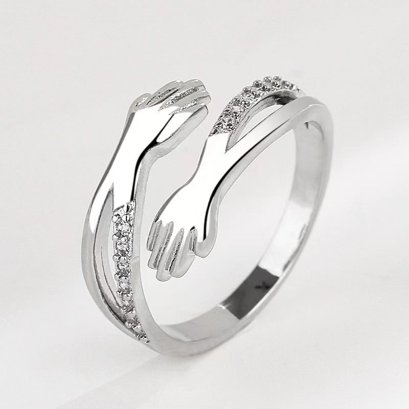 S925 Hollow Embrace Sterling Silver Ring with Diamonds