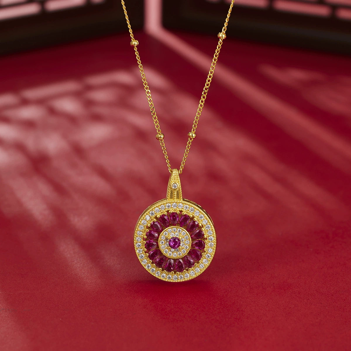 Ruby Red Sunburst Medallion Pendant Necklace | 18K Gold Plated