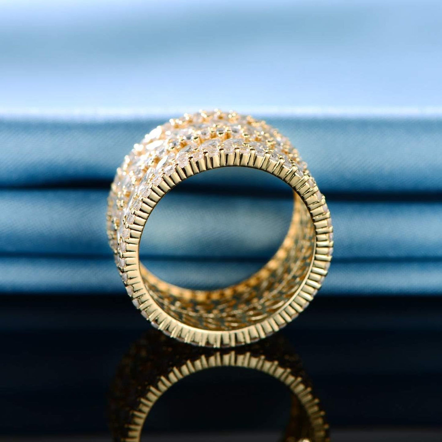 Wide-faceted marquise-shaped cubic zirconia ring