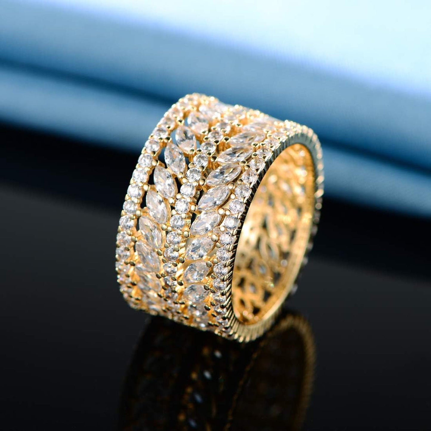 Wide-faceted marquise-shaped cubic zirconia ring