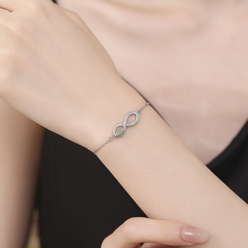 Adjustable Sterling Silver Infinity Bracelet with Leaf Design